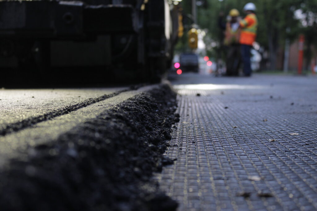 Image of Spartan Road Grid being used for asphalt reinforcement. 