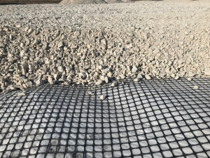 Differences Between Geogrids & What You Need to Know 2 Swamp Grid in use, placed under gravel aggregate base.